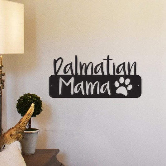 Showcase your love for Dalmatians with our Dalmatian Mama Metal Wall Art, that celebrates the special bond between dog moms and their spotted companions.   With the words "Dalmation Mama" with a sweet paw print.