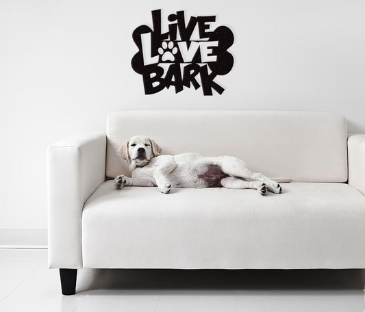 Bring a touch of warmth and personality to your space with this charming Live Love Bark metal wall art.  It says "Live Love Bark" with a paw print and bone.