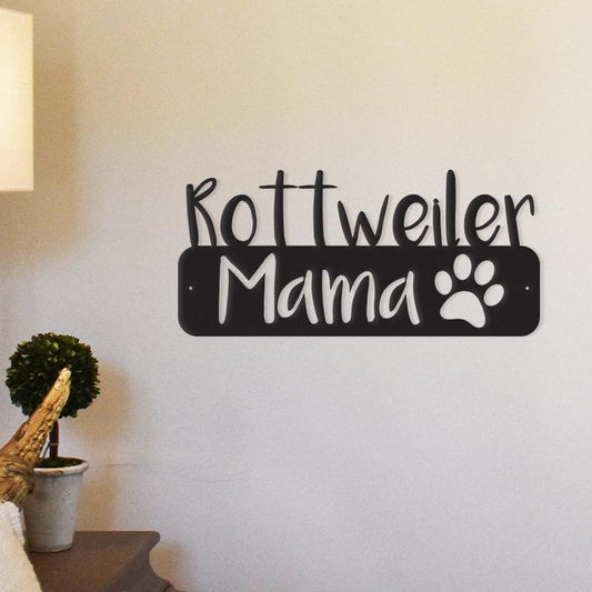 Celebrate your love for Rottweilers with this vibrant metal wall art!  It says "Rottweiler Mama" with a paw print.